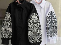 Жіноча вишиванка чорна з золотими квітковими 